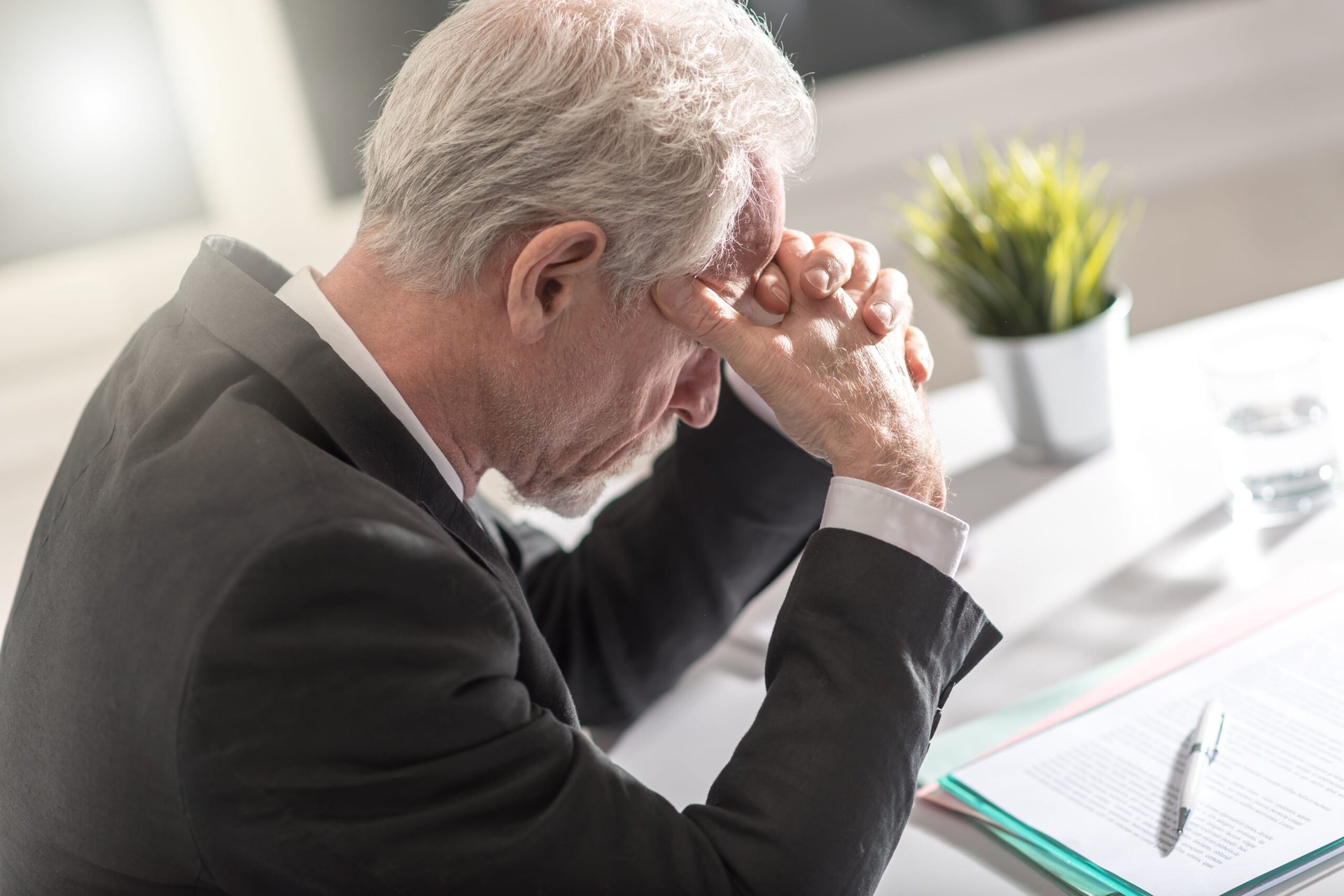 Stressed senior man worried about retirement finances