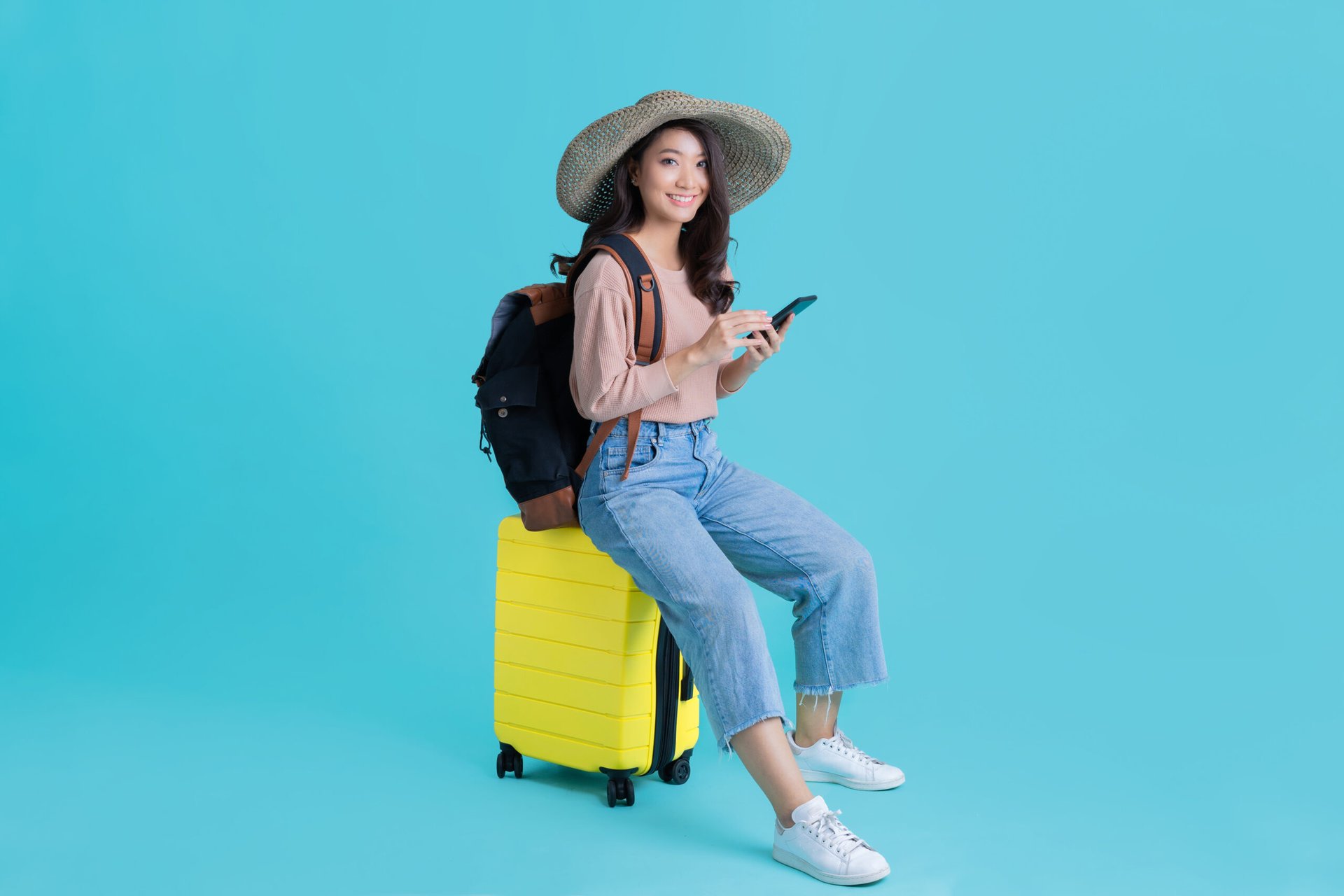 Woman traveling with her phone