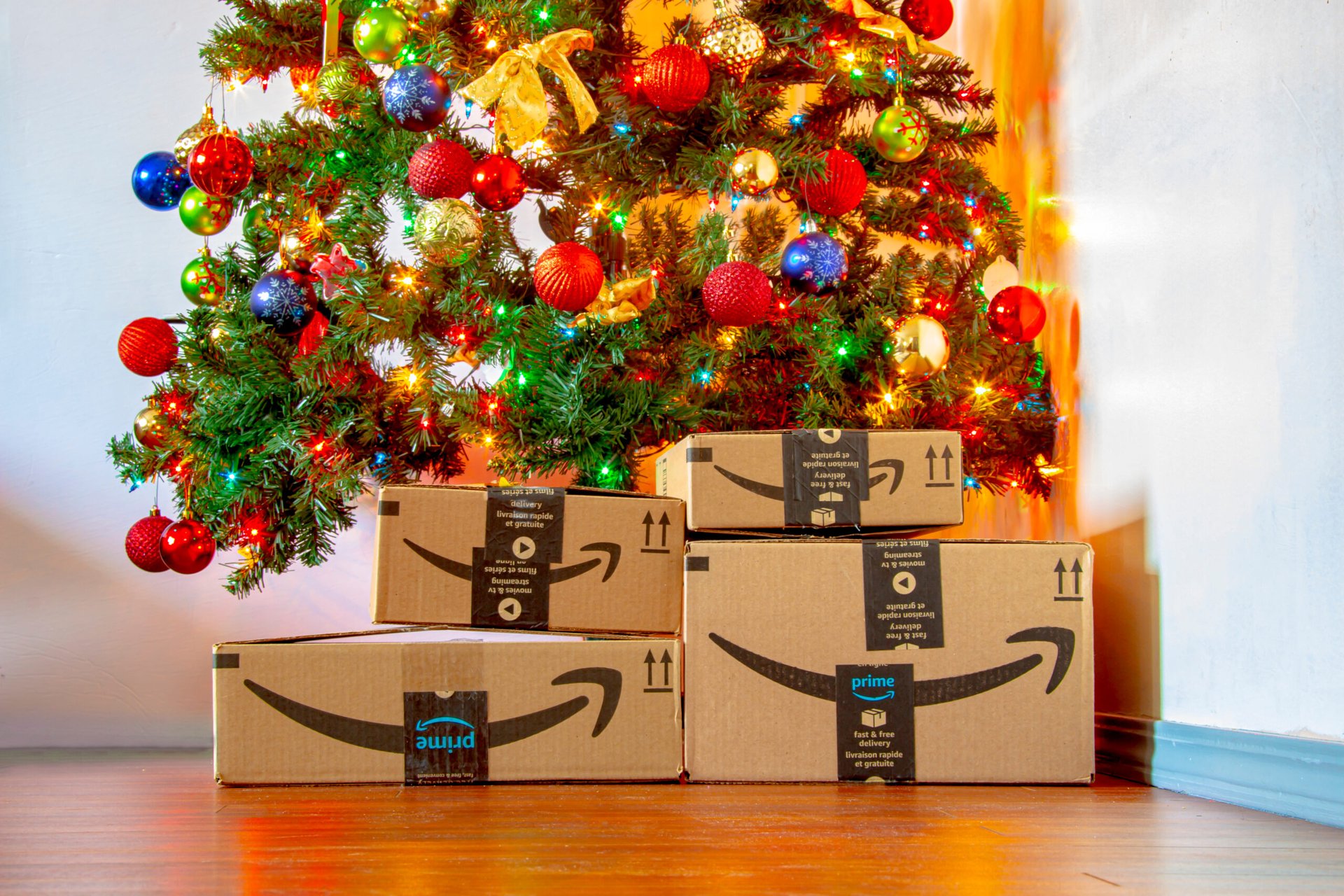 Amazon boxes under a Christmas tree