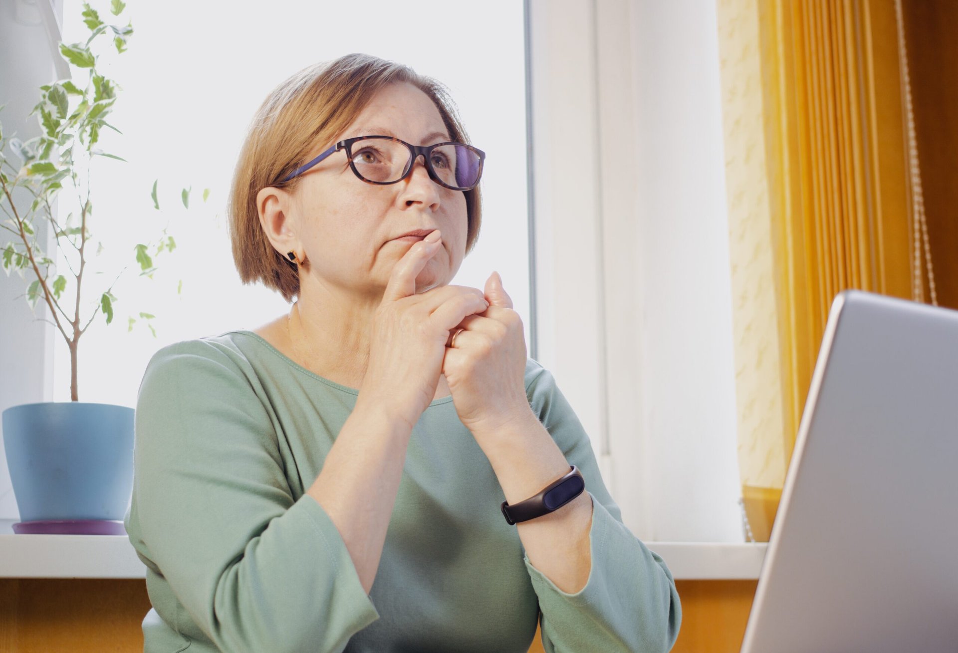Woman thinking about her retirement finances