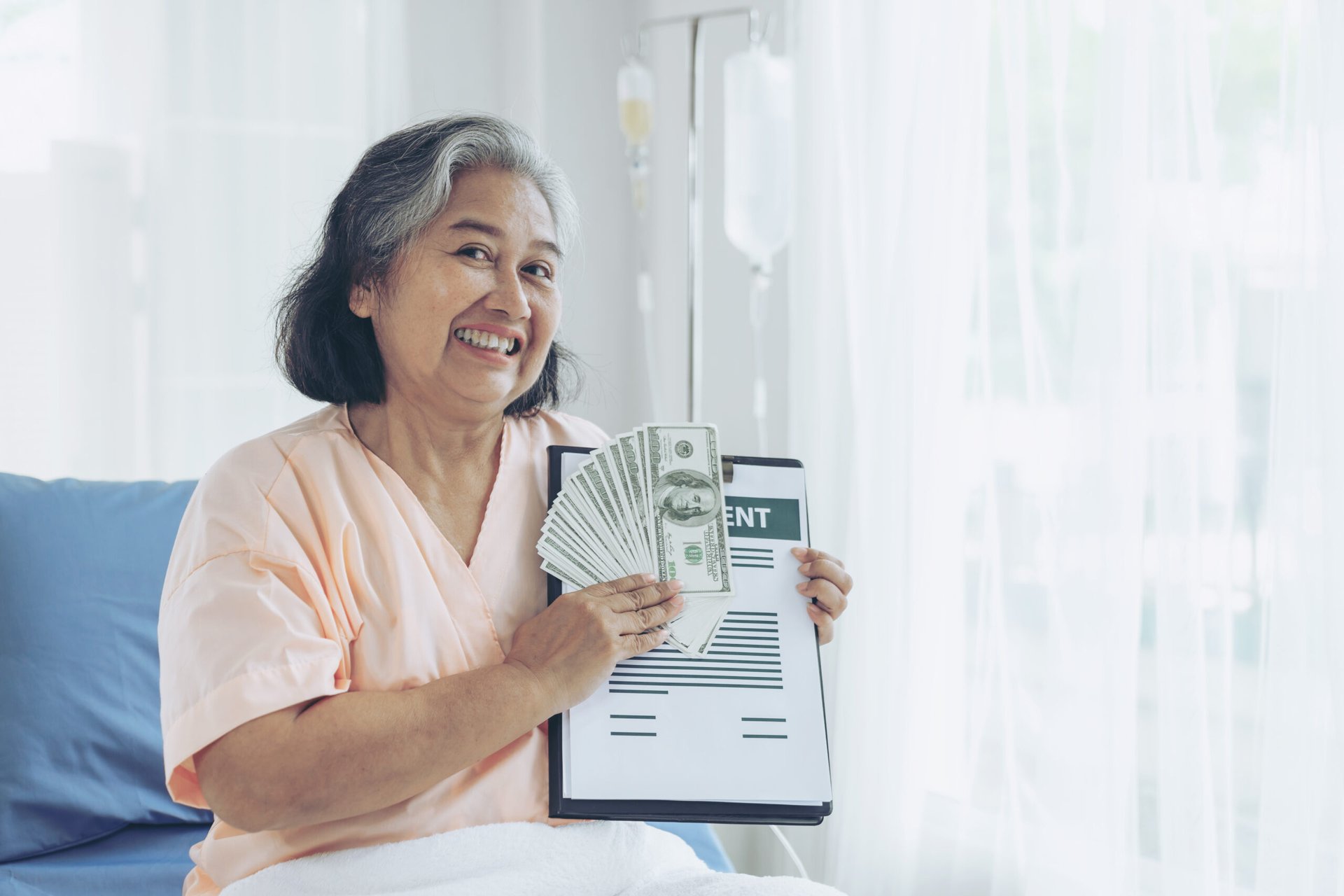 Woman with an insurance form and money