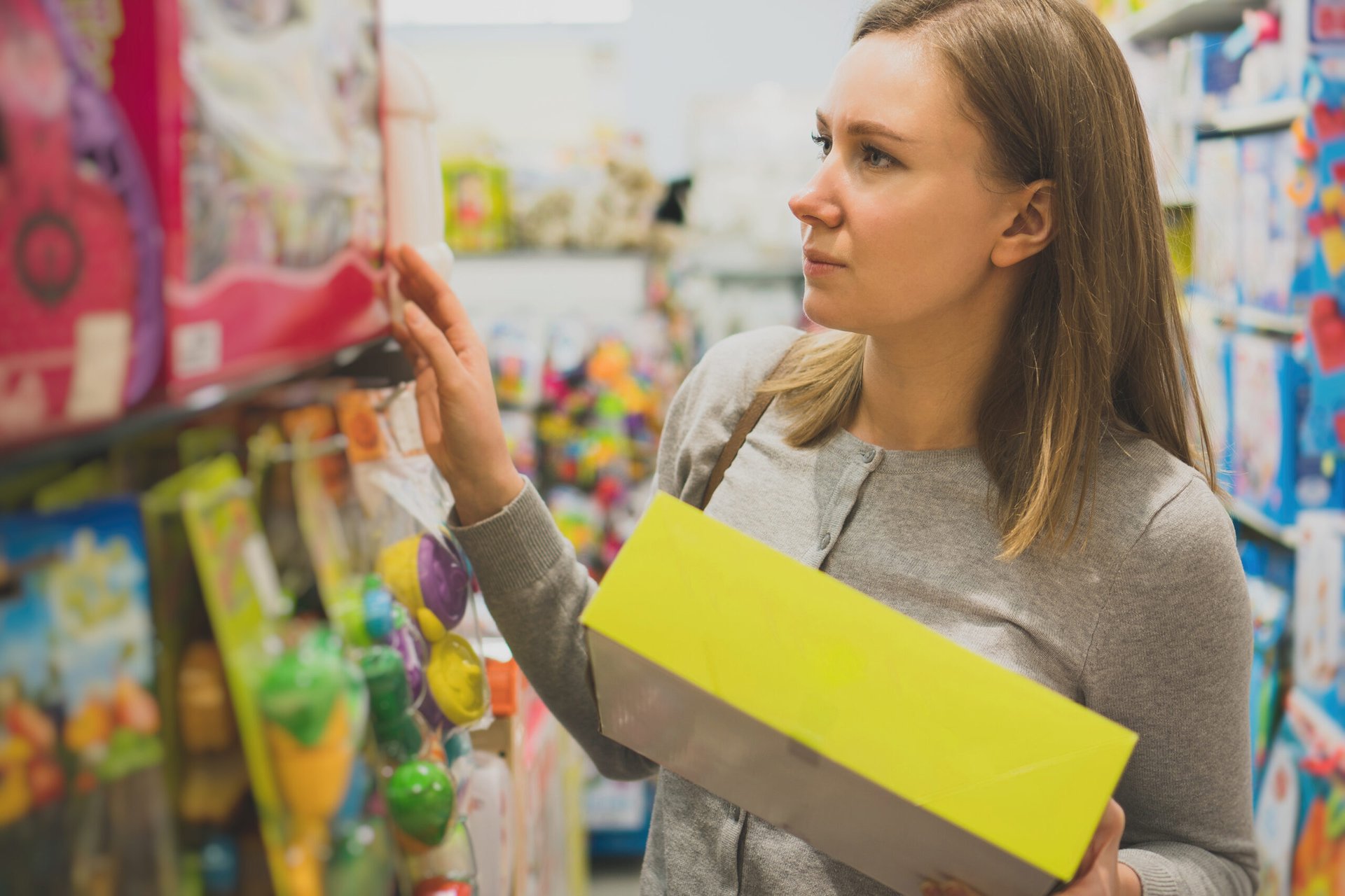 A woman shopping for toys