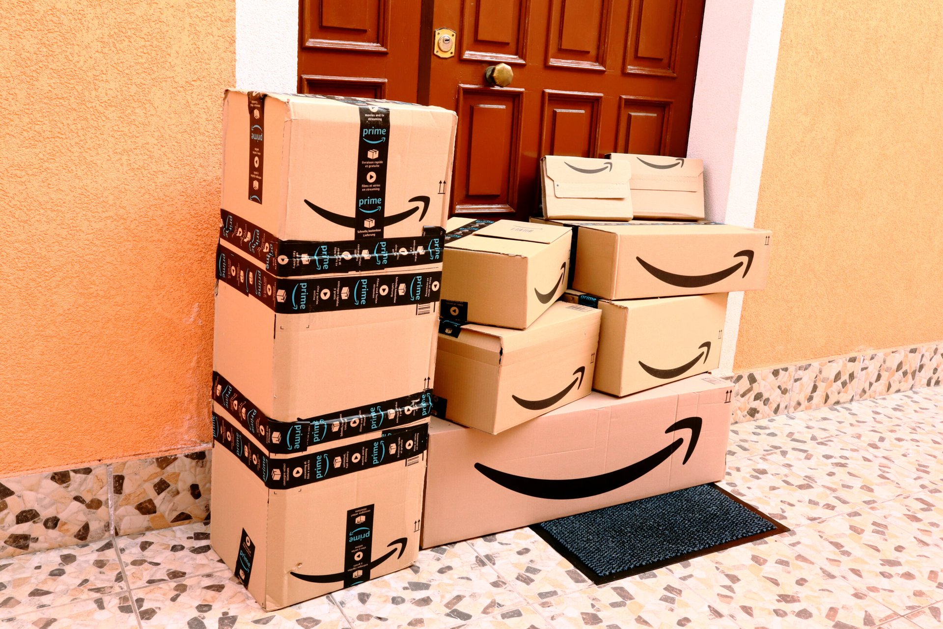 Amazon boxes at a front door