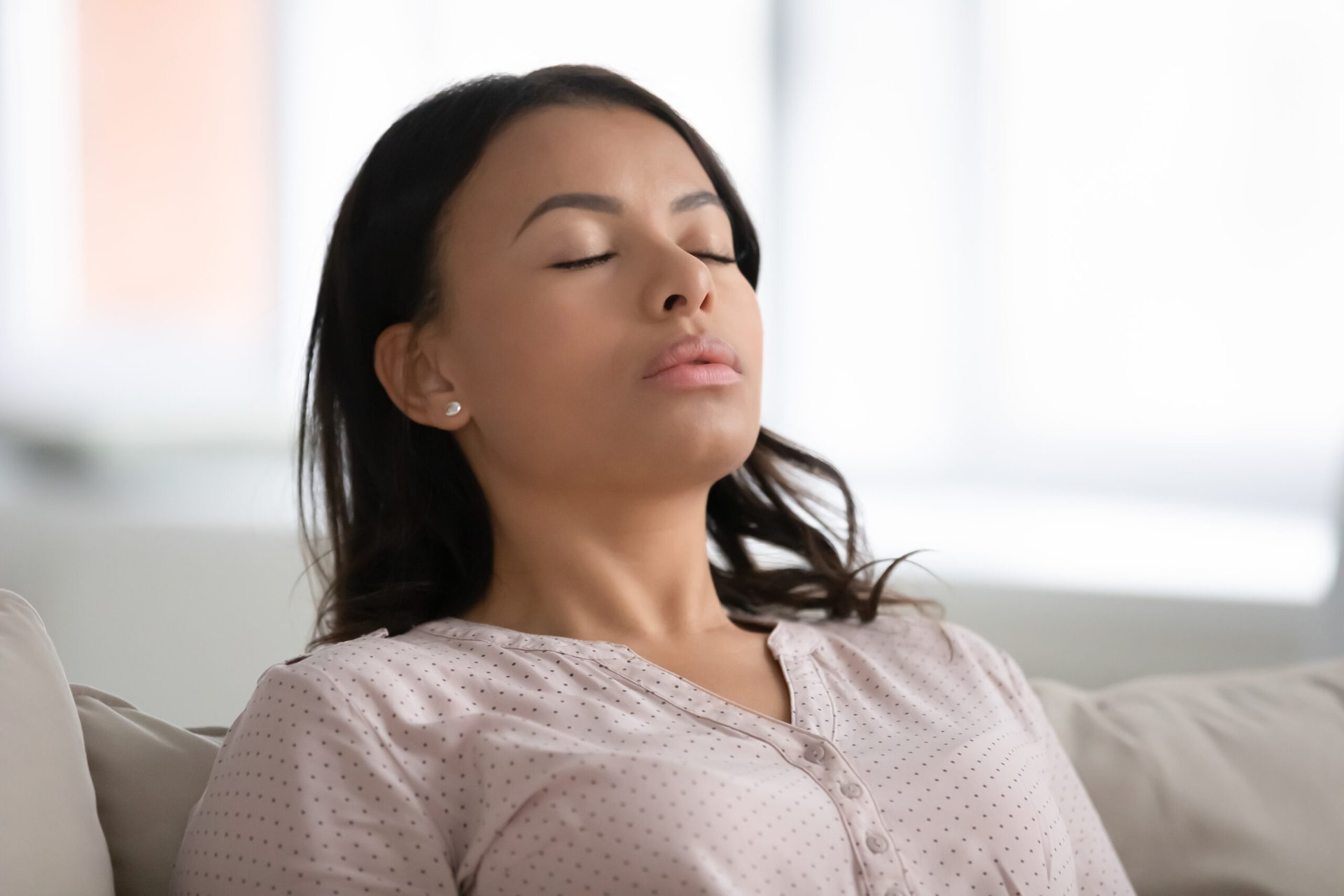 Woman engaged in a breathing exercise