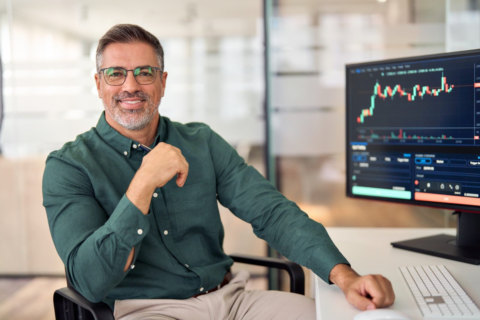 Man looking at a stock chart