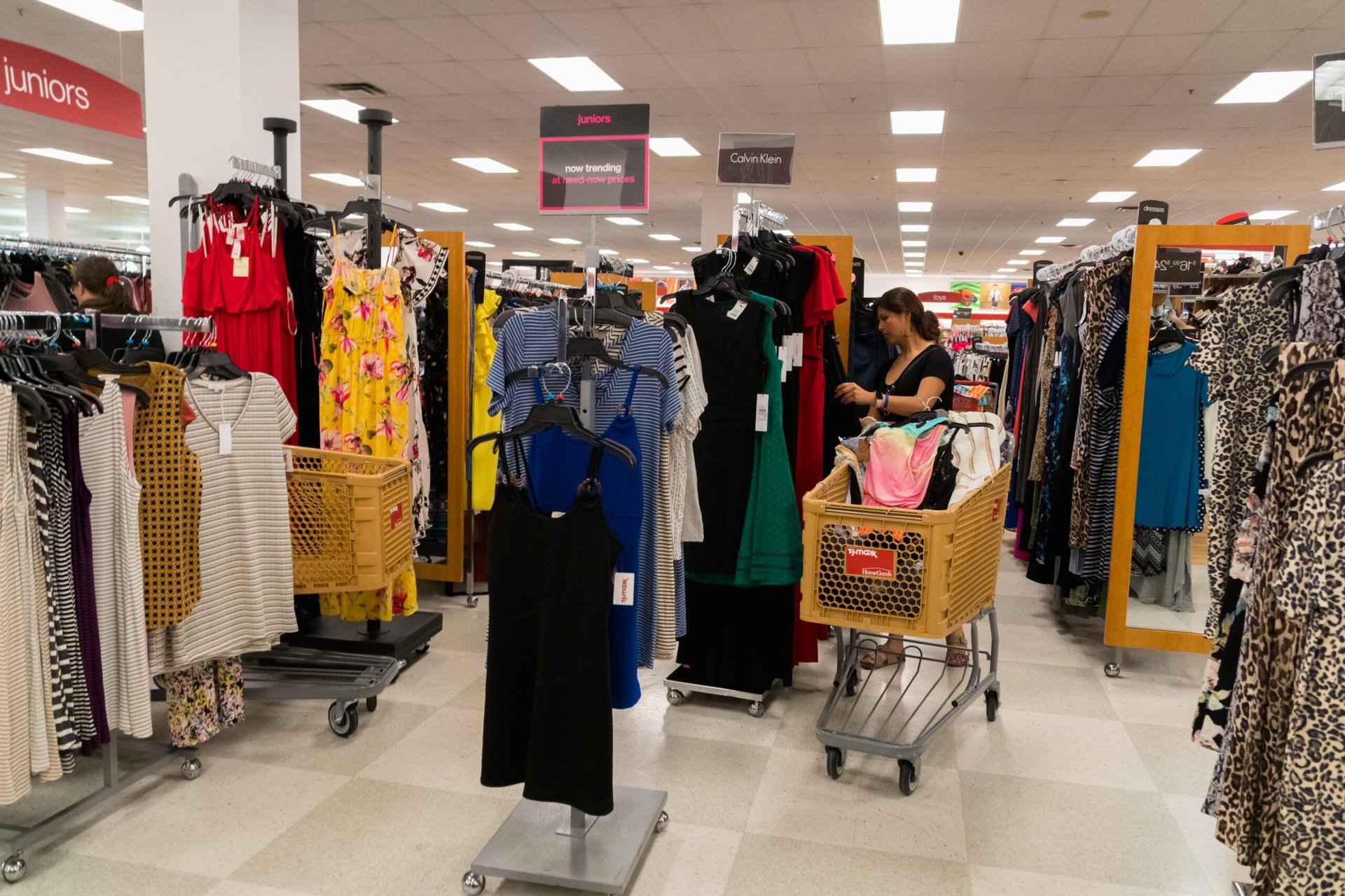 Woman shopping for clothing at T.J. Maxx