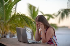 Stressed Florida resident at her computer