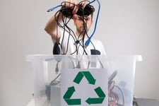 Hazardous E-Waste Recycling. Household electrical and scrapped electronic devices in recycle box.