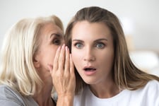Older woman reveals secret to younger woman