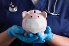 Piggy bank with a surgical mask