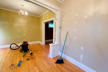 A home remodeling project with fresh paint and open space for touching up walls