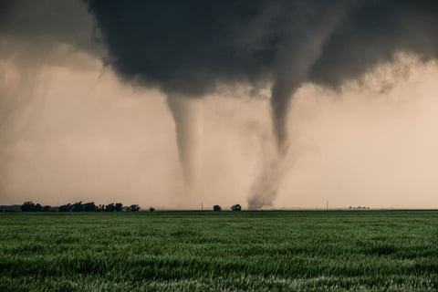 Two tornadoes strike in northern Oklahoma farmyards near Cherokee.