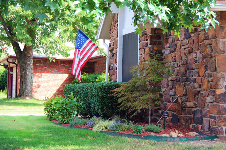 House with U.S. flag
