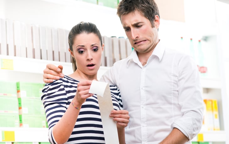Couple overspends at grocery store.