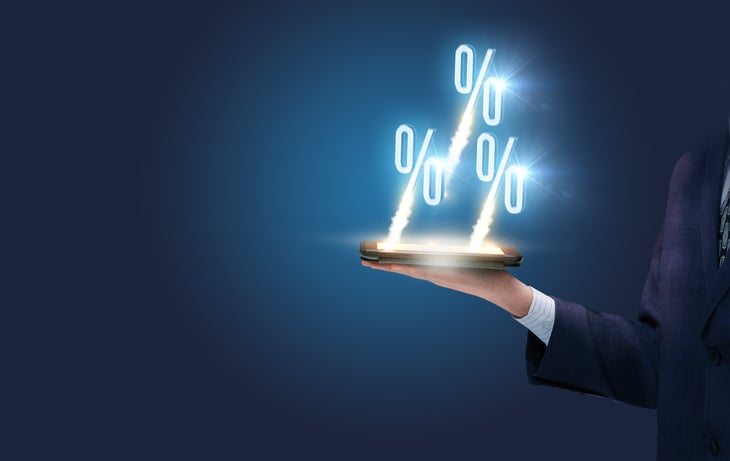 Hand with percentage signs.
