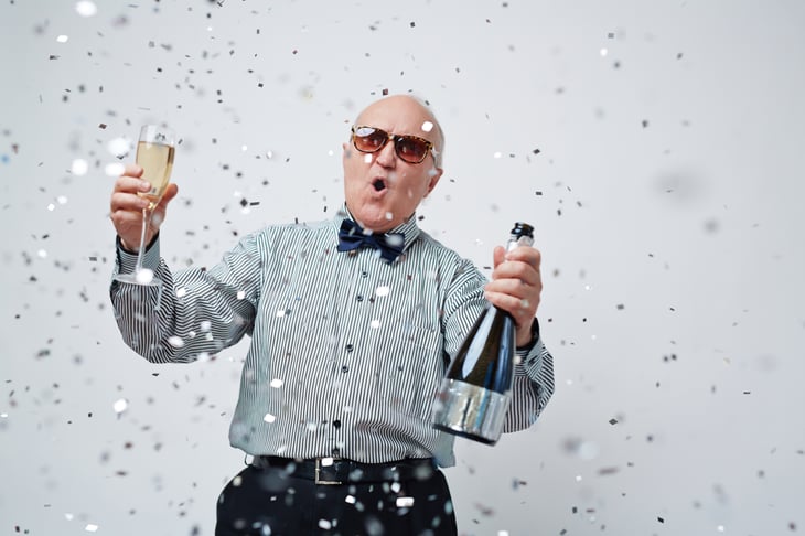 A happy senior celebrates