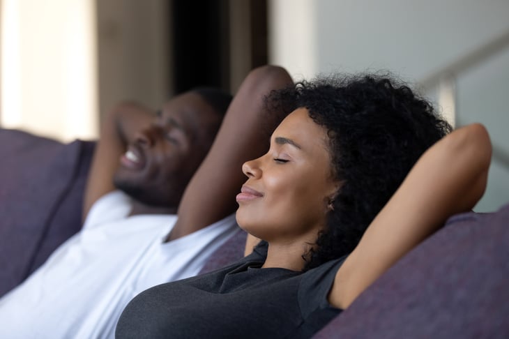 Couple relaxing on the couch