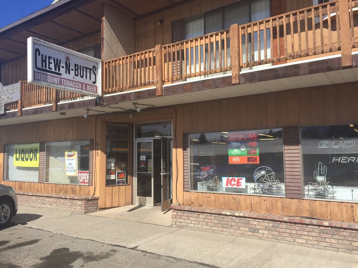 Tobacco store with Chew-N-Butts sign