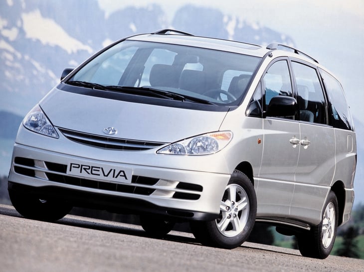 Toyota Previa on mountain road.