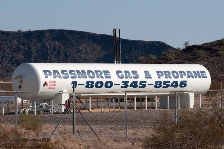 Truck with Passmore Gas & Propane logo on its side.