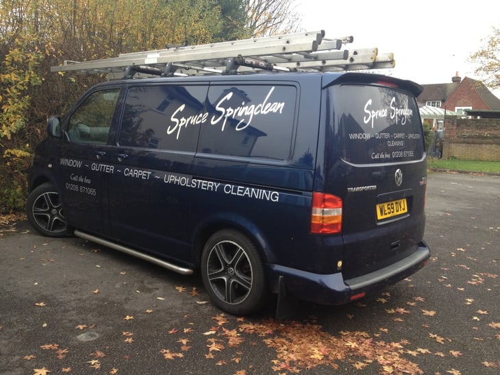 Van with name Spruce Springsteam on the side