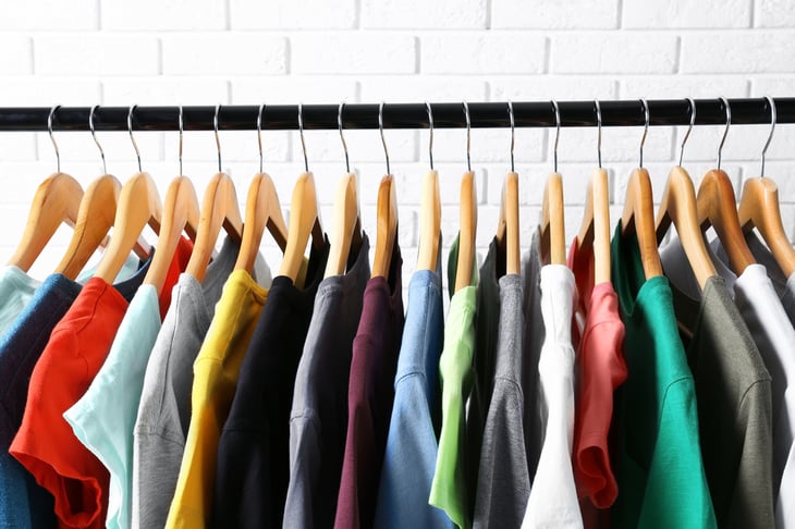 Clothes hang on a clothing rack