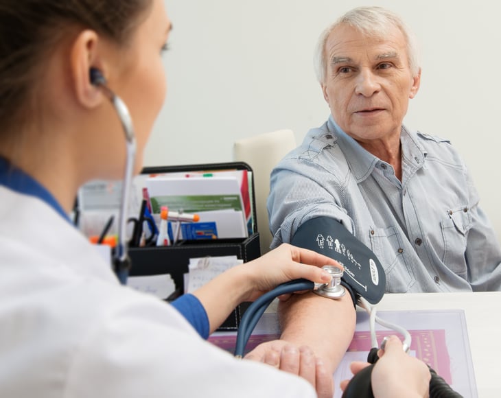 Senior man with nurse