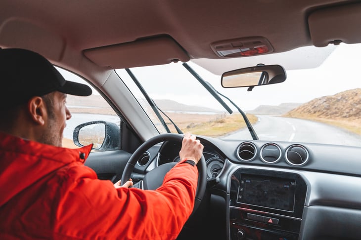 Man driving an SUV