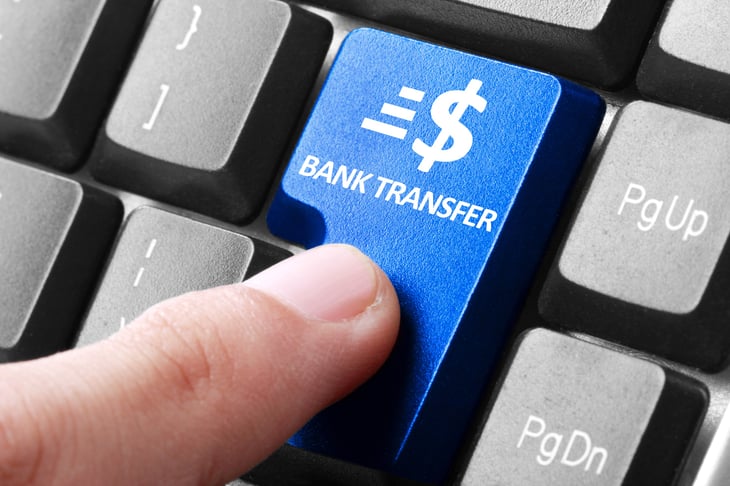A bank transfer button on a keyboard