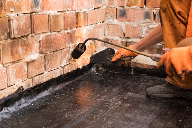 Get an idea of how long you have until you need to replace your roof – and then make a plan to save for that replacement based on that estimate. (Photo by Volodymyr Plysiuk)
