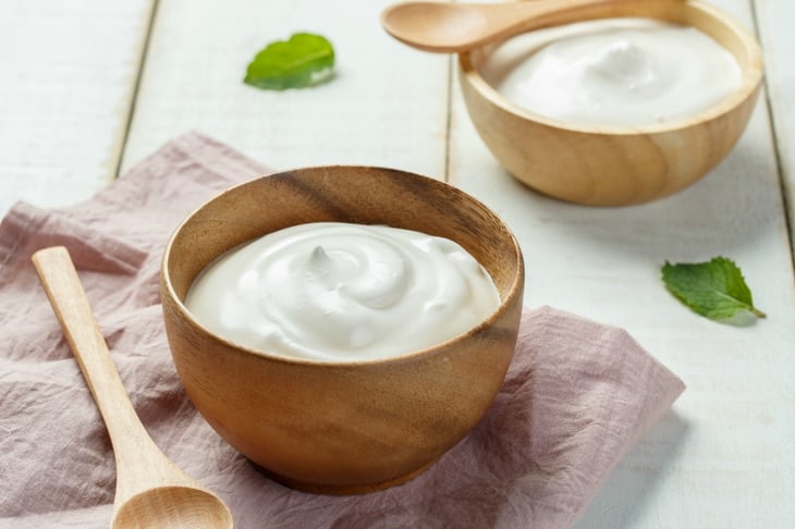 Bowl of white yogurt.