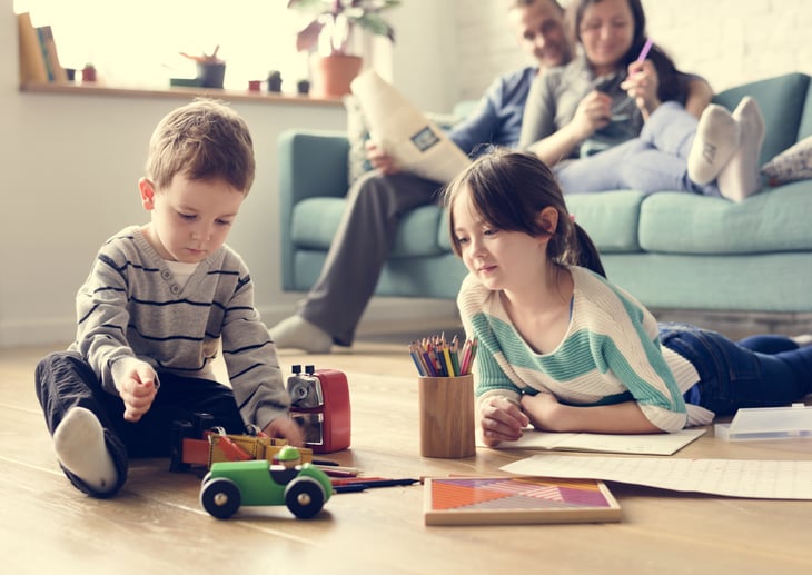 Parents and two children at home.
