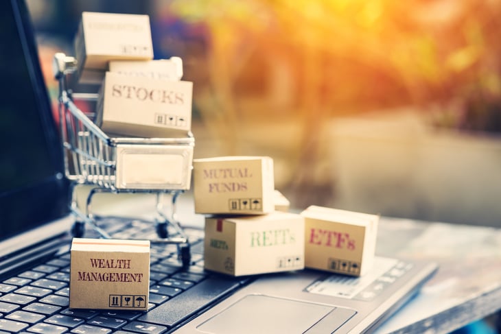 Shopping cart with boxes labelled with financial products.