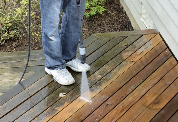 Pressure washer on a deck