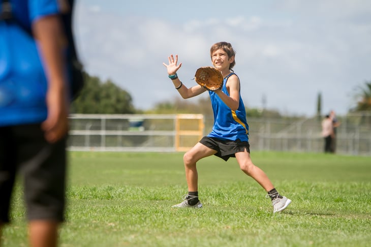 Boy playing softball