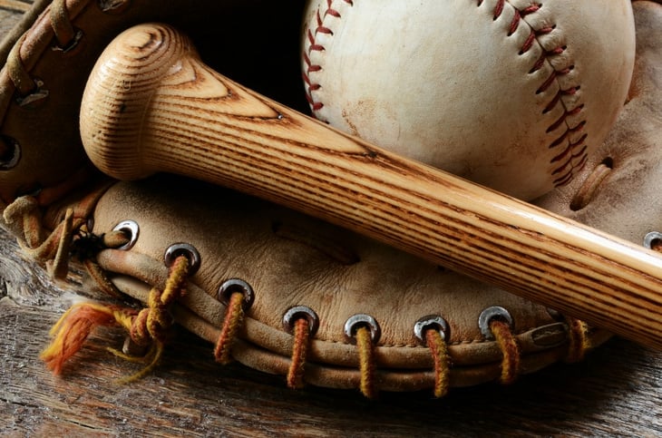 Baseball mitt, bat and ball.