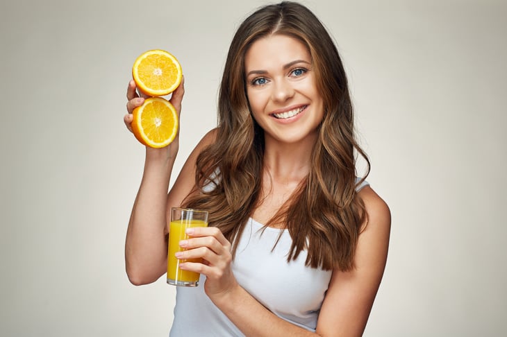 Woman with orange juice