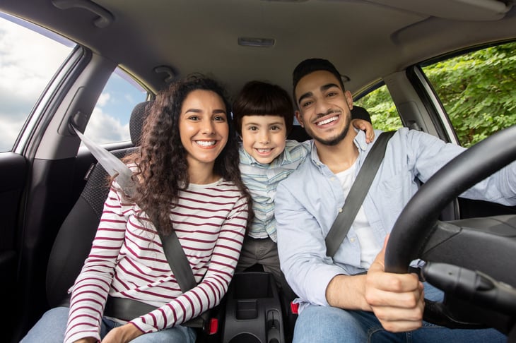Happy family on a road trip