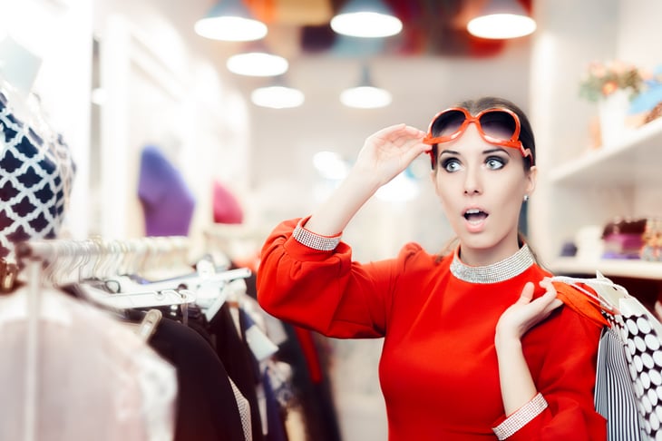 Surprised woman in store.