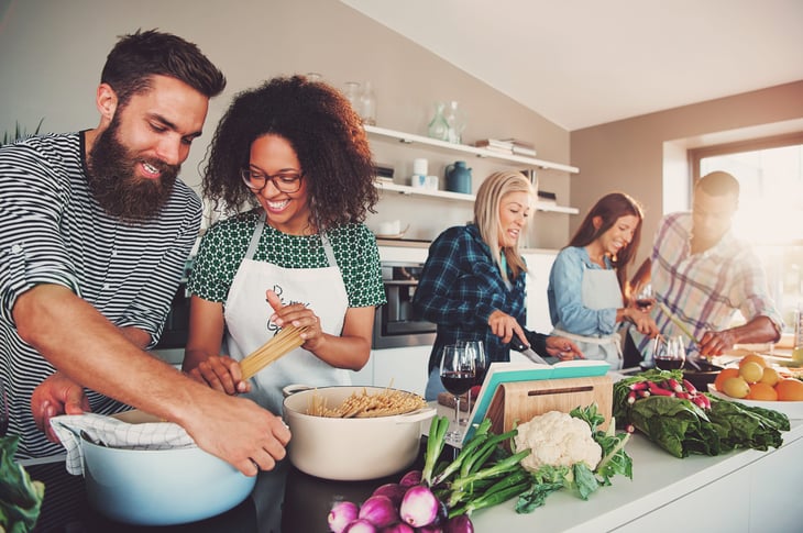 Group of people cooking.