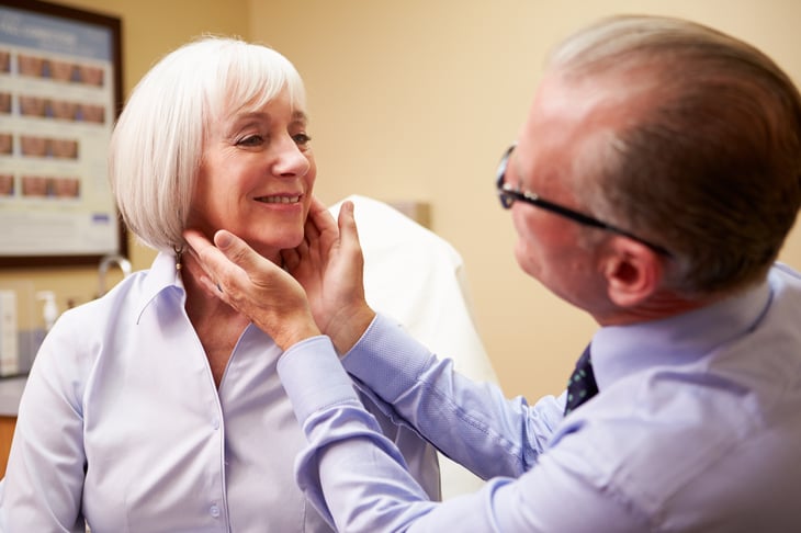 Cosmetic surgeon and patient
