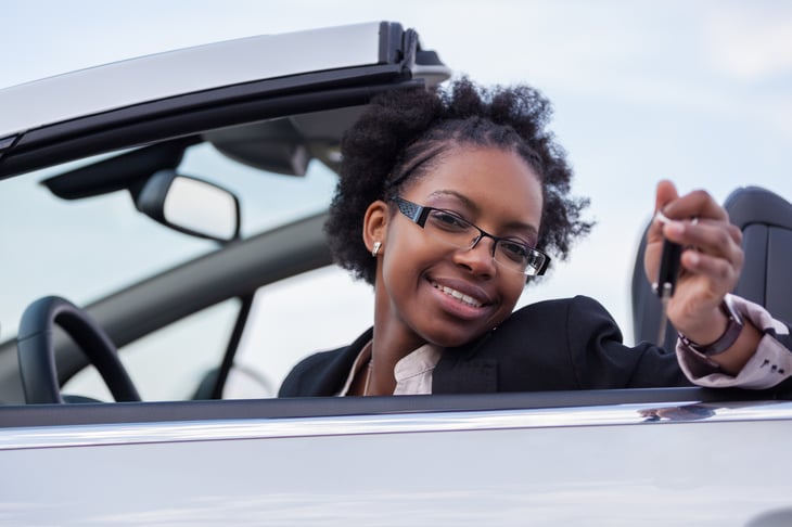 Woman in convertible