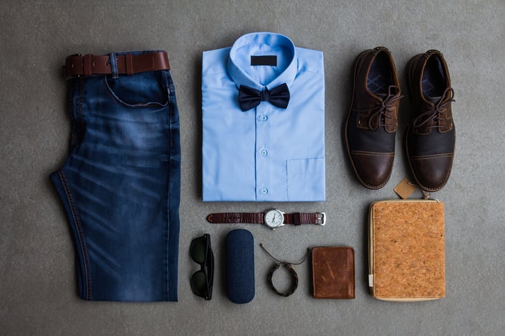 Men's clothes laid out in an orderly fashion.