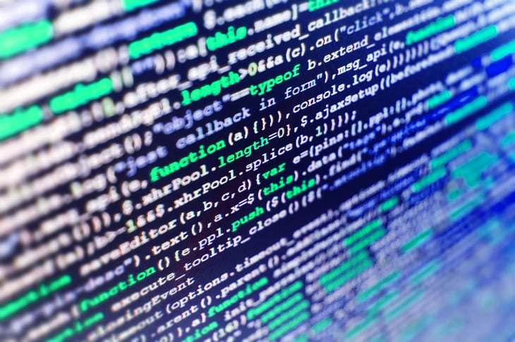 Close up of computer code on screen.