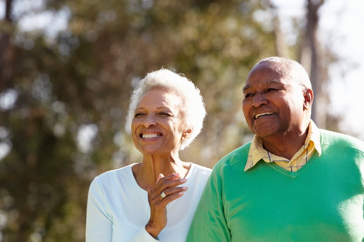 Retirees enjoying a walk outdoors