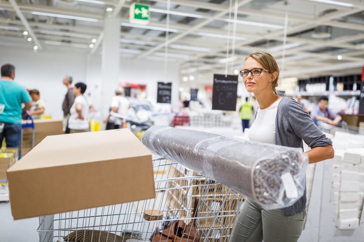 Woman in furniture checkout line