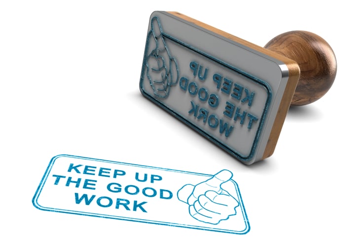 Rubber stamp that reads keep up the good work.
