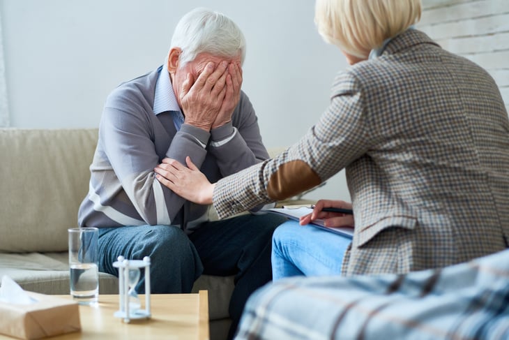depressed crying therapy emotion comfort senior elder older man counseling counslor