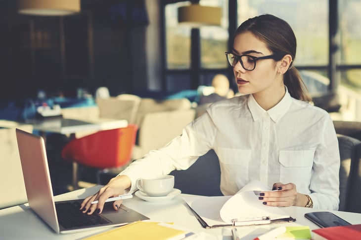 Young woman at computer in office