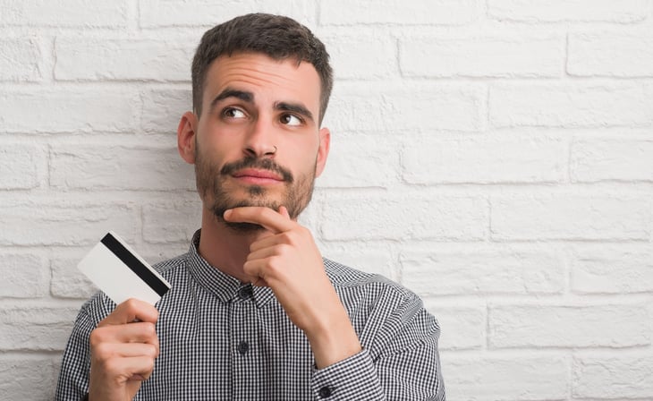 Man asking credit card questions